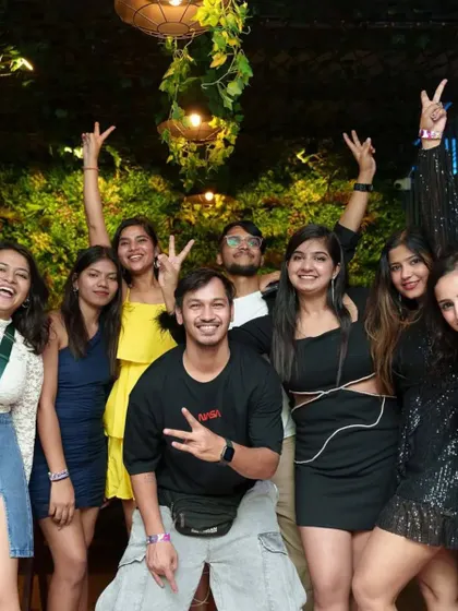 A happy group of friends making memories on a Saturday night. My goal is to be the soundtrack to your best moments.