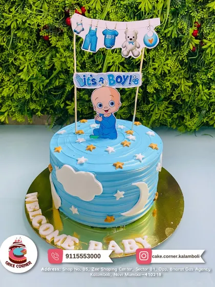 A "Welcome Baby" cake with a Cocomelon theme. The cute baby topper and clothesline decoration make it a fun and modern choice for a baby shower.