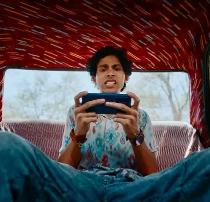 A fish-eye lens shot from inside the taxi for the Bullet Echo ad. The character's printed shirt and wide-legged jeans create a distinct, slightly retro look.