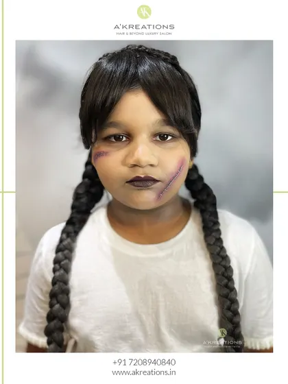 We also do themed makeup for kids! Here's our take on the iconic Wednesday Addams, complete with her signature braids and moody makeup.