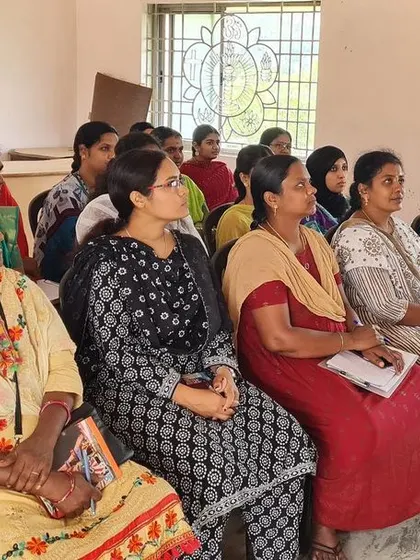 An image capturing the attentive focus of teachers during one of my professional development workshops. I aim to provide valuable, practical advice that helps them feel more confident and effective in their roles.
