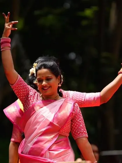 The smiles on our dancers' faces say it all. This performance for a Ganesha festival was filled with devotion and the vibrant spirit of Andhra Telangana folk dance.