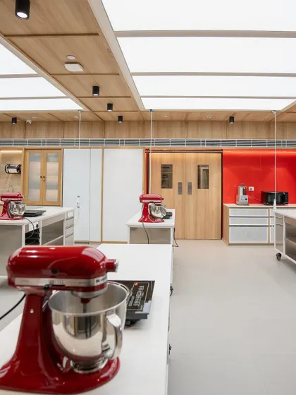 A close-up of the KitchenAid mixers that are a staple in our classes.