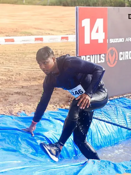 Navigating a water obstacle at the Devil's Circuit. These challenges test your balance and ability to adapt to changing surfaces.