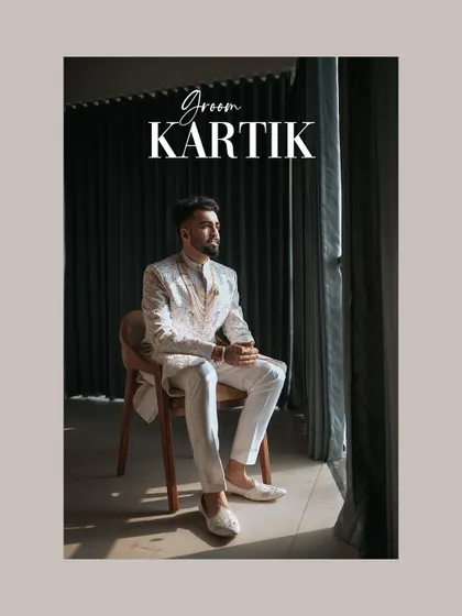 A classic portrait of the groom, Kartik, seated and looking out the window, lost in thought before his wedding.