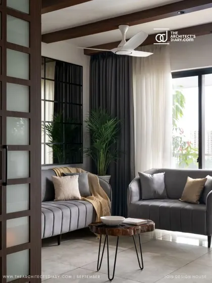 Another living room shot from the 'Nordic Grey Apartment' feature.