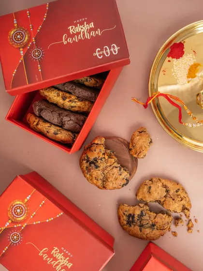 A modern twist for Rakhi celebrations, featuring gourmet cookies. This flat lay combines traditional elements like a thali with a contemporary product, showing our versatility in styling.