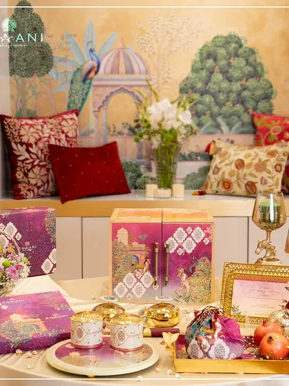A full wedding invitation suite, showcasing how I blend tradition with personalized luxury. The ornate boxes, themed jars, and custom stationery all work in harmony to create an unforgettable first impression.
