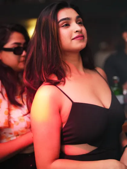 Another happy face in the crowd, making the night special.