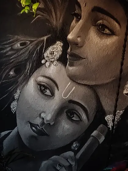 A close-up of the finished Krishna mural. The piece was painted for Mother's Day and aims to capture the divine love between mother and child, rendered with realistic shading and detail.