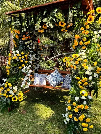 A full view of the sunflower-adorned swing, a popular and beautiful spot for photos at this Haldi event.