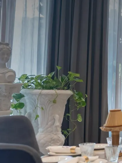 A detail shot from our Begeterre project, where our classic grey dining chairs are set against the restaurant's Greco-Roman decor. The furniture is chosen to complement the artistic and historical theme.