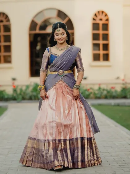 The perfect blend of tradition and elegance. This langa voni, made from an upcycled saree, is a testament to timeless South Indian style.
