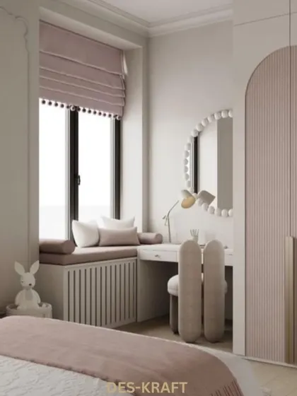A dedicated vanity area with a unique beaded mirror and arched wardrobe doors in a soft pink hue, combining playful shapes with sophisticated design.