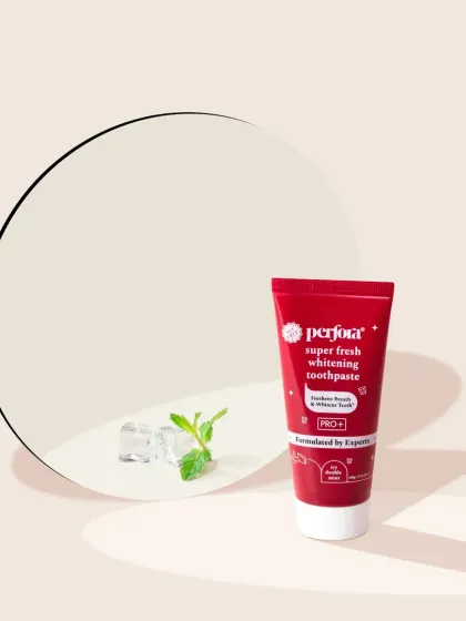 This clean composition for Perfora whitening toothpaste uses a neutral color palette and simple props like ice cubes and mint to convey a sense of cool freshness.