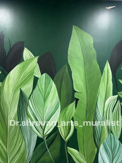 A deep green wall covered in lush, layered tropical leaves. This design creates an immersive, jungle-like feel, making the wall a rich and vibrant focal point.