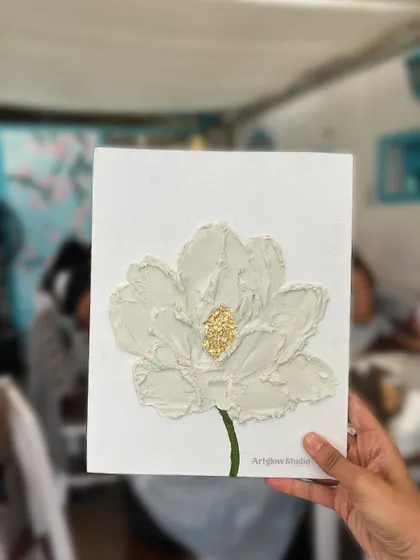 Another look at a beautifully crafted textured flower. The details in the center are made with delicate gold foil.