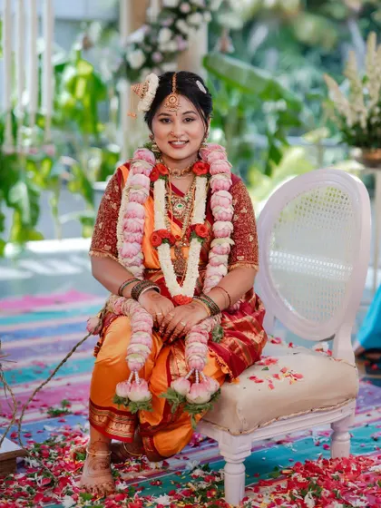 A beautiful portrait of the bride on her wedding day. The traditional makeup and Madisar drape create a look of pure elegance.