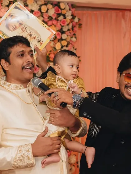 "Laughter is my favorite mic check!" A fun moment with a baby and his father on stage. I love creating these sweet, memorable interactions.