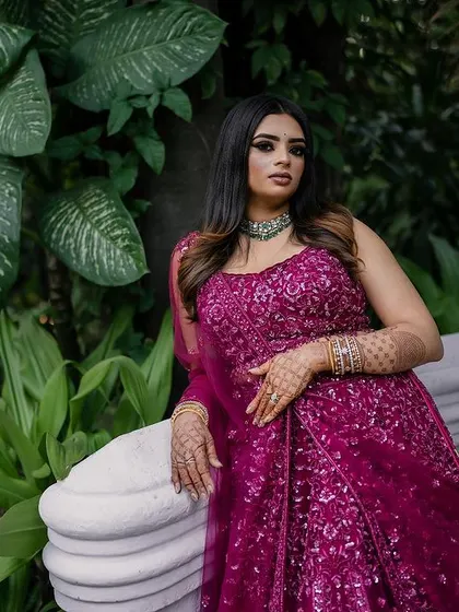 A stunning reception look at the Taj Westend. We use dramatic lighting and elegant backdrops to create sophisticated and timeless portraits for your evening events.