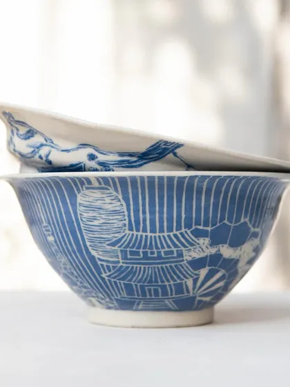 These tastefully made ramen bowls were created by our Foundation students. They are beautifully decorated with detailed sgraffito work inspired by Japanese patterns, landscapes, and culture, turning a functional item into a piece of art.