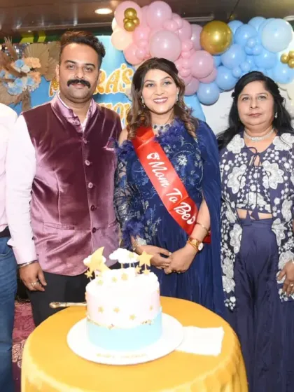 A group photograph with the family at the baby shower. Capturing the entire family together is essential for remembering who shared in your joy.