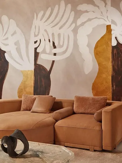 An interior that embodies the Japanese art of Kintsugi, where imperfections are celebrated as part of an object's history. This panoramic wallpaper transforms a wall into a piece of art, with golden fissures highlighting the beauty in resilience and creating a space of serene, contemplative luxury.