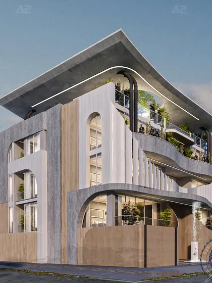 This independent house design blends sleek lines with the timeless allure of exposed concrete. The graceful curves woven into the facade create a dynamic visual rhythm, while a tranquil waterbody integrates nature into the urban setting.