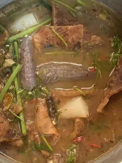 A full pot of the buff skin curry, ready to be served.