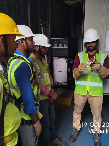 A technician demonstrates the proper use of insulated gloves and LOTO devices. Hands-on training ensures our team is proficient in using personal protective equipment (PPE) and safety tools correctly.