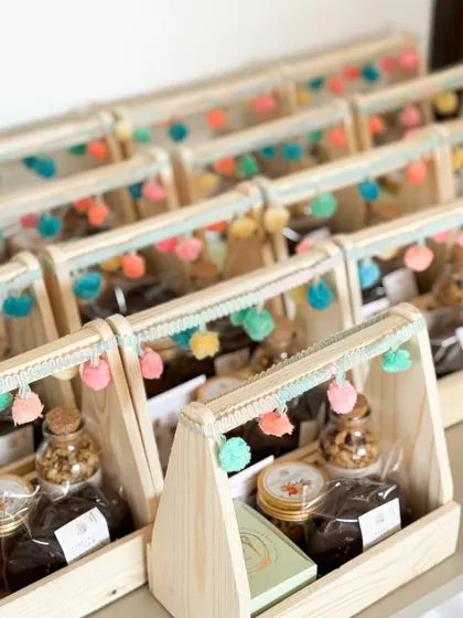 A closer look at our wooden hampers for a baby boy announcement. We can customize the decor and treats to perfectly match your theme and preferences.