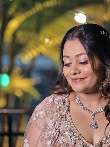 A beautiful close up of Nehal's sangeet makeup. The pink eyeshadow makes her eyes pop, and the diamond necklace adds the perfect amount of sparkle.