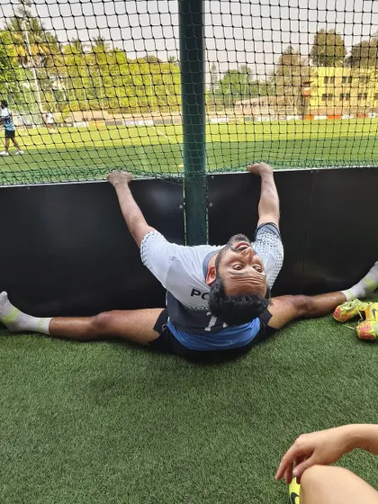 The face you make when you're stretching out sore muscles. It's a mix of pain and relief, but it's essential for staying injury-free as an athlete.