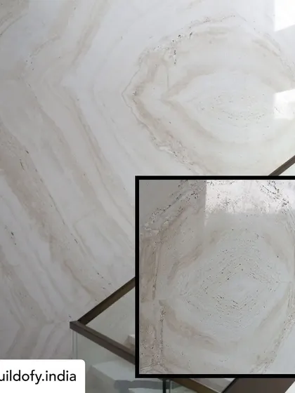 This image shows the natural beauty of Travertino marble, which we used to clad the walls around the staircase. I chose to embrace its natural stains and blemishes, as they add character and a sense of history to the space.