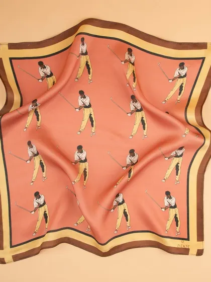 A draped view of the pink golfer pocket square, highlighting the sheen and texture of the fabric.