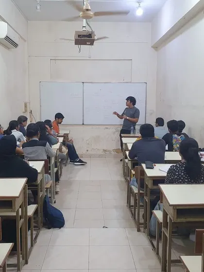 Our instructor leading a classroom session on safety principles and employability skills for economics students at R.D. National's College. Our approach integrates mental preparedness with physical techniques.