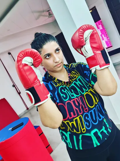 You will not always be motivated, so you must learn to be disciplined. Here I am, ready for a boxing workout, focused and determined.