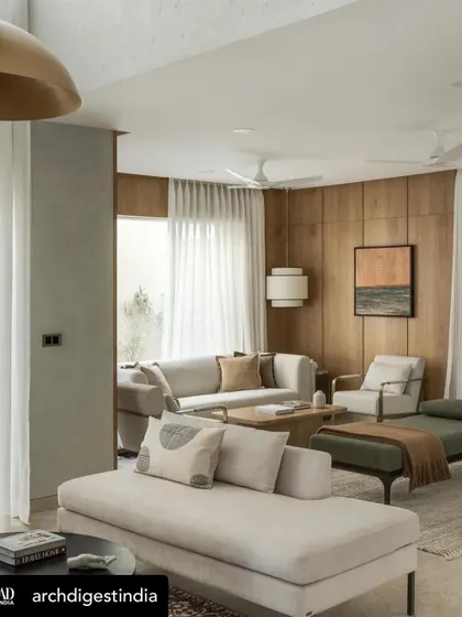 Another view from the Weespaces project, showing our custom daybeds and lounge chairs in a serene, wood-paneled family room.