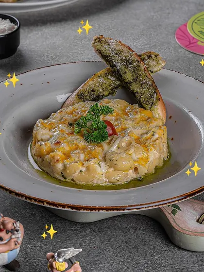Our creamy baked mac and cheese is a hit with guests of all ages. It's the ultimate comfort food.