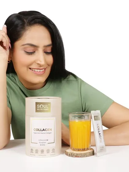 A candid style lifestyle shot of a model with the collagen product. Her happy expression and the bright setting create a positive and relatable visual for wellness marketing.