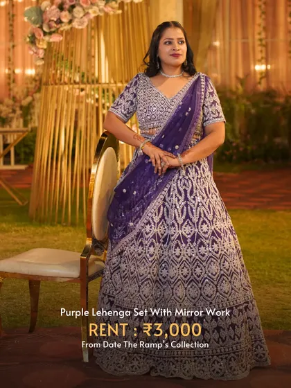 A rich purple lehenga set with all-over mirror work. This outfit is guaranteed to make you shine on the dance floor.