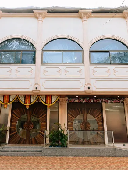 The grand entrance to the Kalidas Marriage Hall, ready to welcome your guests. We believe the first impression sets the tone for the entire celebration.