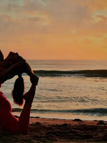 Ocean therapy and vitamin sea. Practicing King Pigeon Pose on the beach at sunrise is a truly magical experience, connecting the deep heart-opening stretch with the vastness of nature.