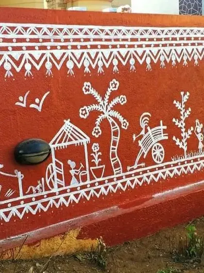 A close-up of the Warli mural showing scenes of farming and daily village activities. This type of detailed storytelling is what makes traditional Indian wall art so special and personal.