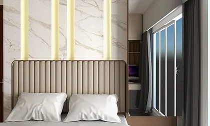 A close-up of the upholstered headboard and the marble-and-light feature wall. This combination of soft texture and hard surfaces adds a lot of visual interest to the room.