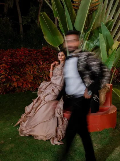 A stylish reception look. We love capturing the glamour and fun of the evening party, from the designer outfits to the happy, candid interactions.