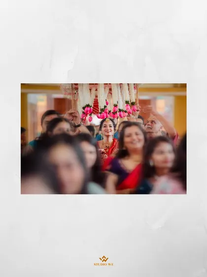 A beautiful shot of the bride being escorted to the ceremony, her face full of anticipation and joy.