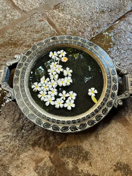 Flowers floating in a traditional urli. A simple, beautiful reminder that today is an opportunity to smile a little more and be a little more grateful.