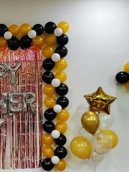 This shot shows the balloon bouquet accent we placed next to the main backdrop.