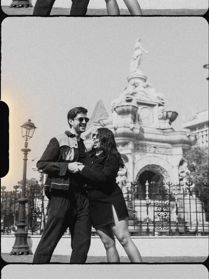 A classic black and white shot with a film-strip effect, capturing a dance in front of the Flora Fountain. This style adds a timeless, nostalgic feel to the photos.